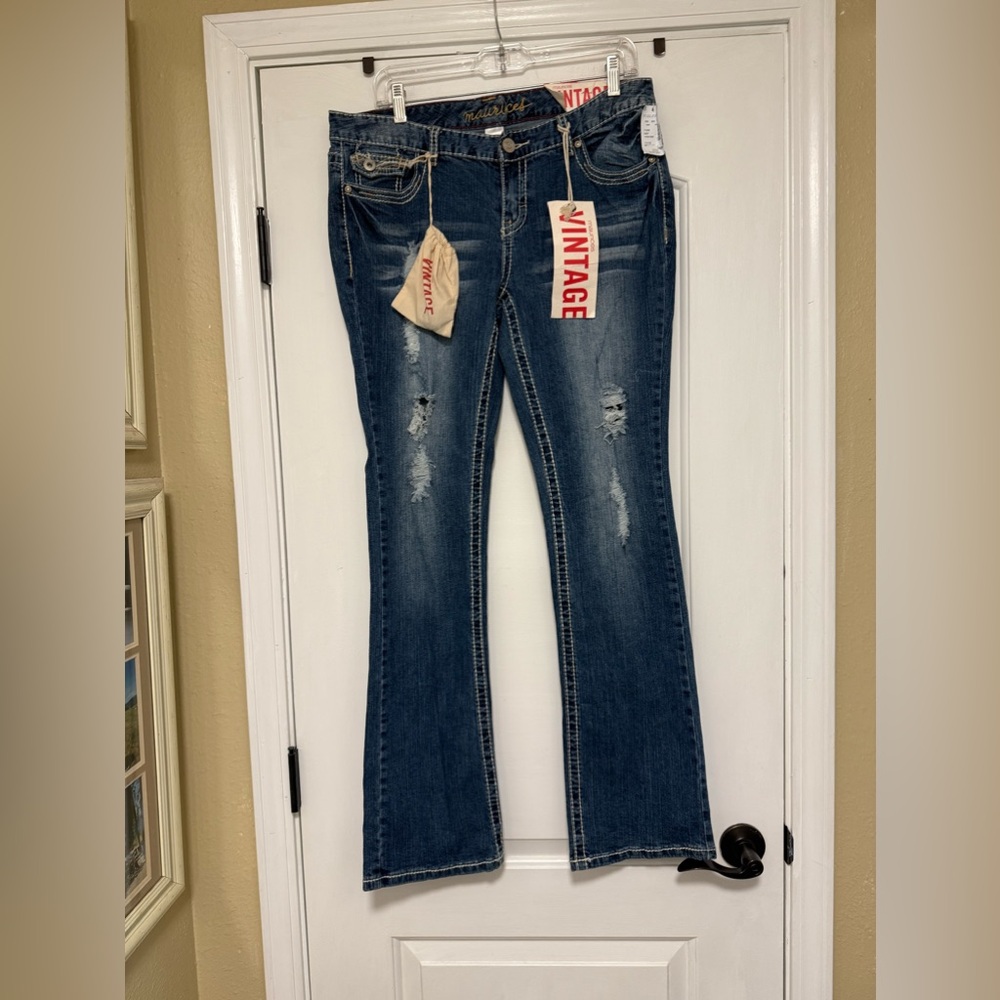 Maurice’s size 11/12 vintage stretch slim boot jeans. New with tags.